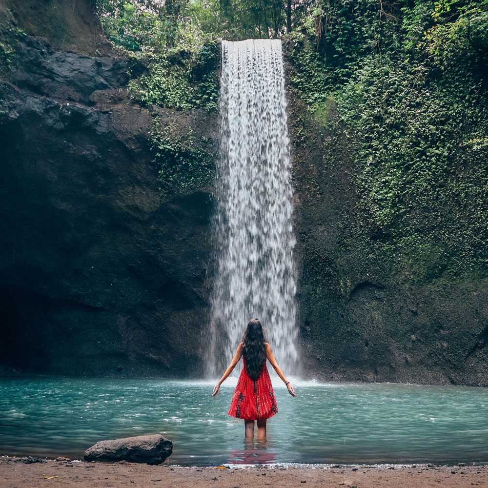 revenue generation, sara garcia training course, girl standing in front of a waterfall