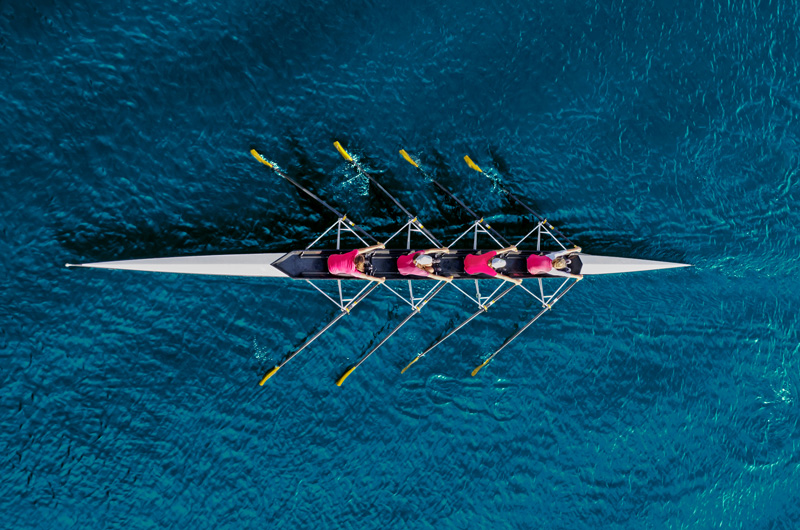 maslow's error blog post image, rowers in water